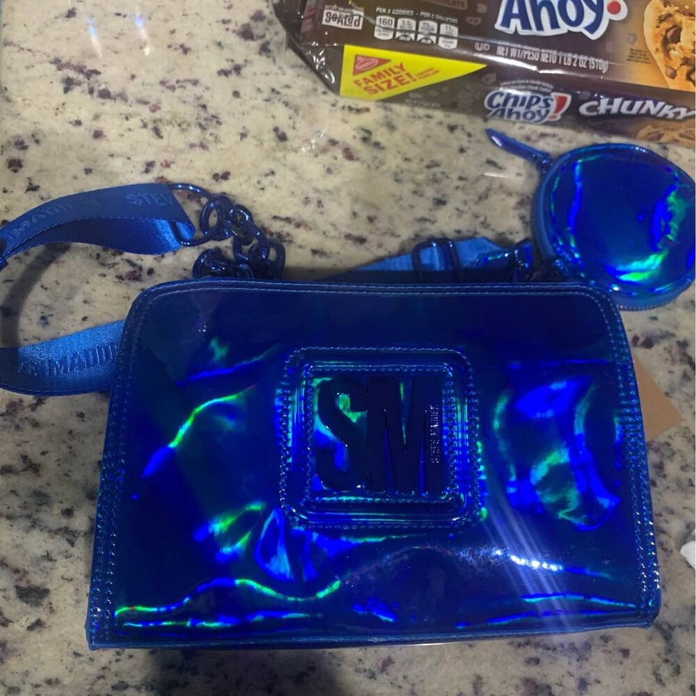 Steve Madden Iridescent Blue crossbody adjustable strap w/ many compartmentsNew